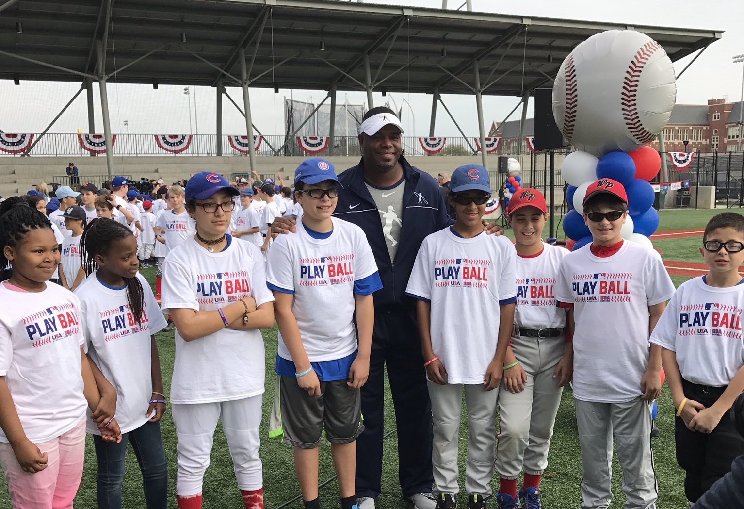 Team USA players watch in awe as MLB-great Ken Griffey Jr. takes